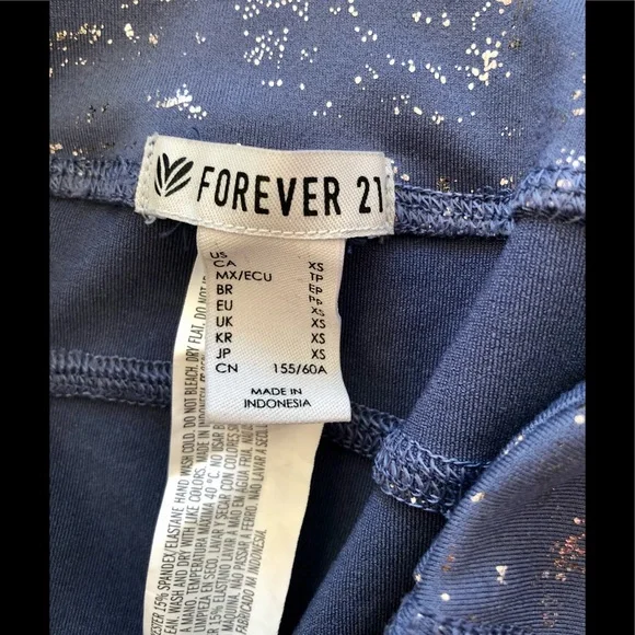 Forever 21 workout leggings with purple and silver, has side pockets XS - Picture 4 of 7